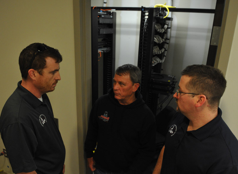 Armada Disaster Solutions employees in Information Technology closet